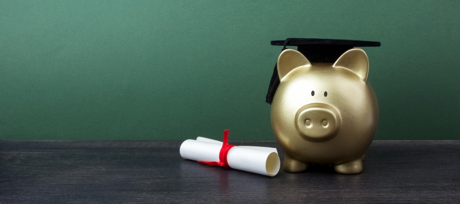 Piggy bank with diploma