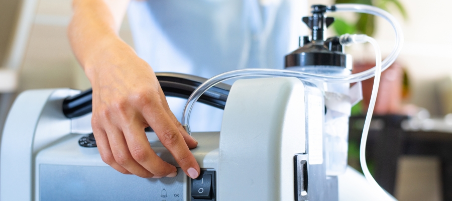 Woman uses oxygen concentrator