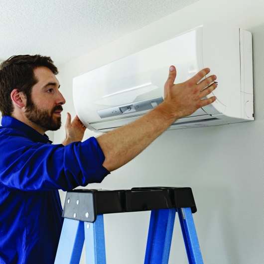 Man installing air handler