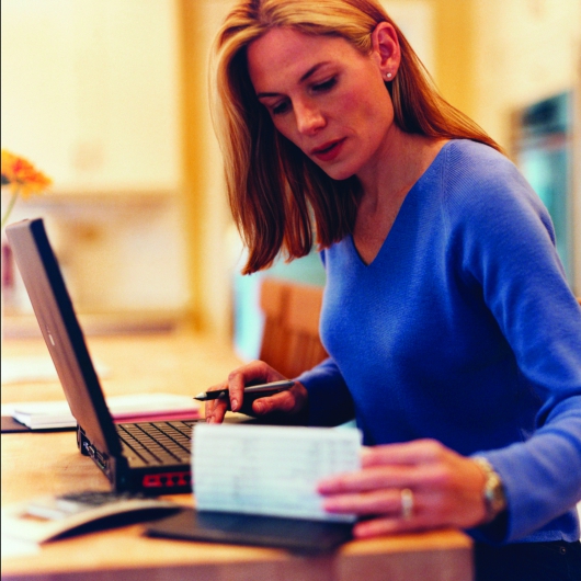 Woman paying bills 